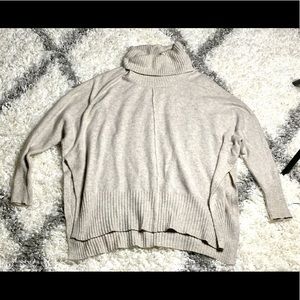 Jessica Simpson Cream turtle neck long, high side slit.